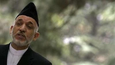 کرزی در آمريکا، سربازانش کارگران را ربودند!