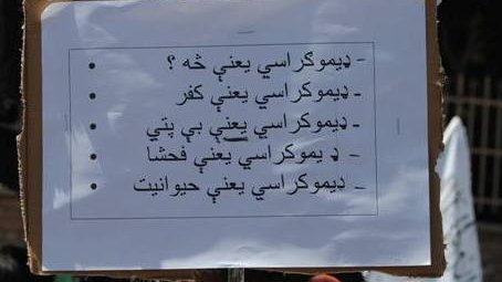 Mullah Omar's supporters rally against women's rights