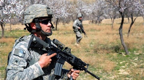 U.S. government sugar-coats Afghan war news for sweet-toothed U.S. media