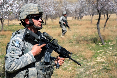 U.S. government sugar-coats Afghan war news for sweet-toothed U.S. media
