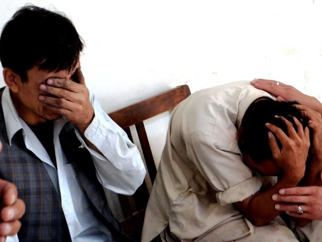 A file photo of mourning members of the Hazara community. PHOTO: AFP/FILE